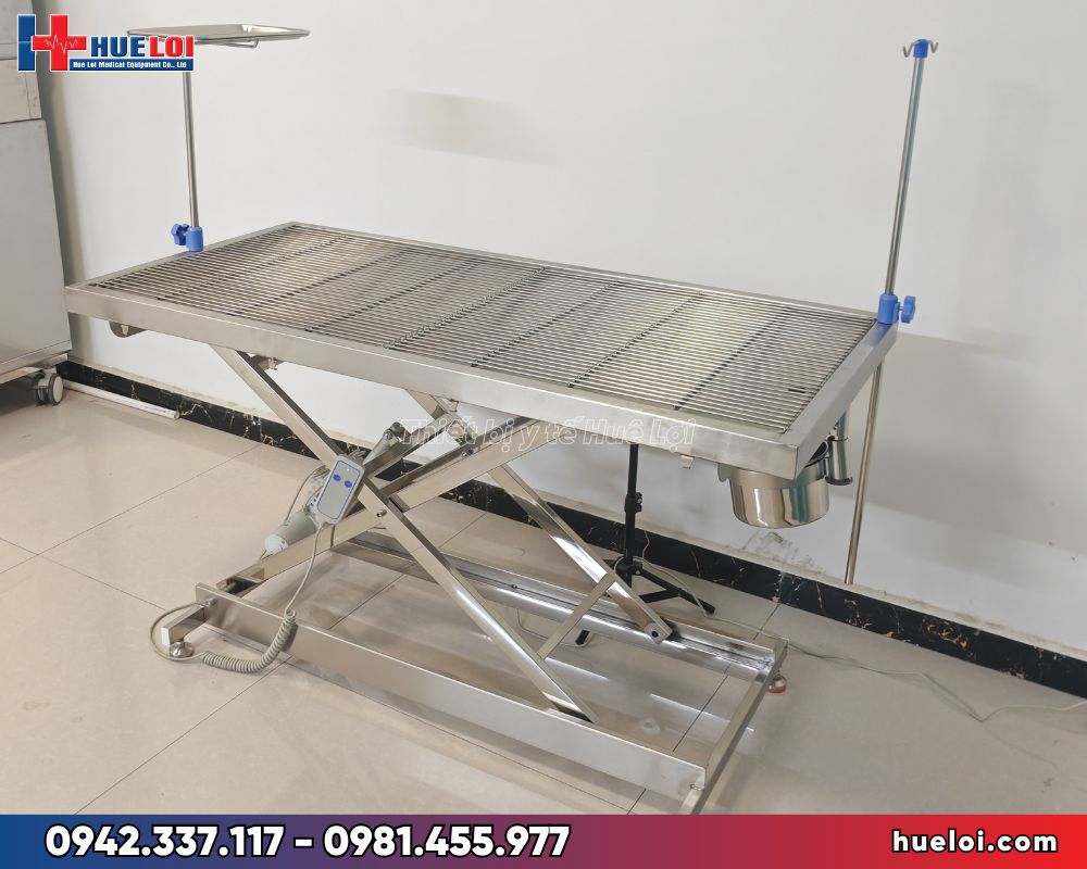 Bàn mổ thú y giá rẻ chân chữ X nâng hạ điện